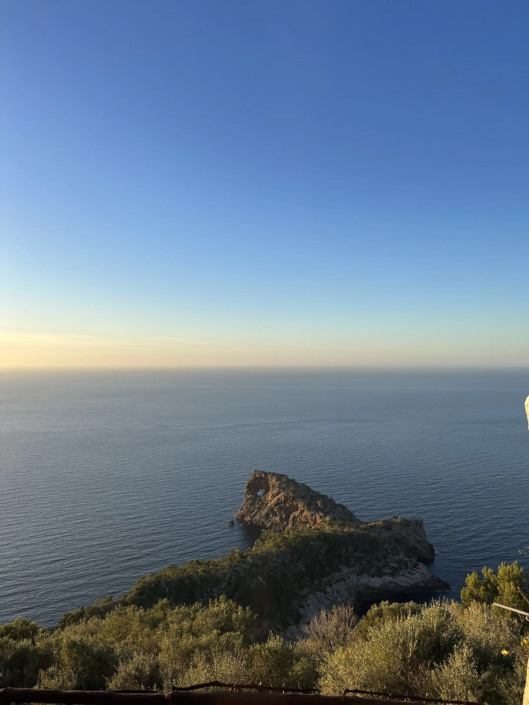 The Sa Foradada peninsula running out into the sea, seen from above at the Son Marroig estate at sunset.